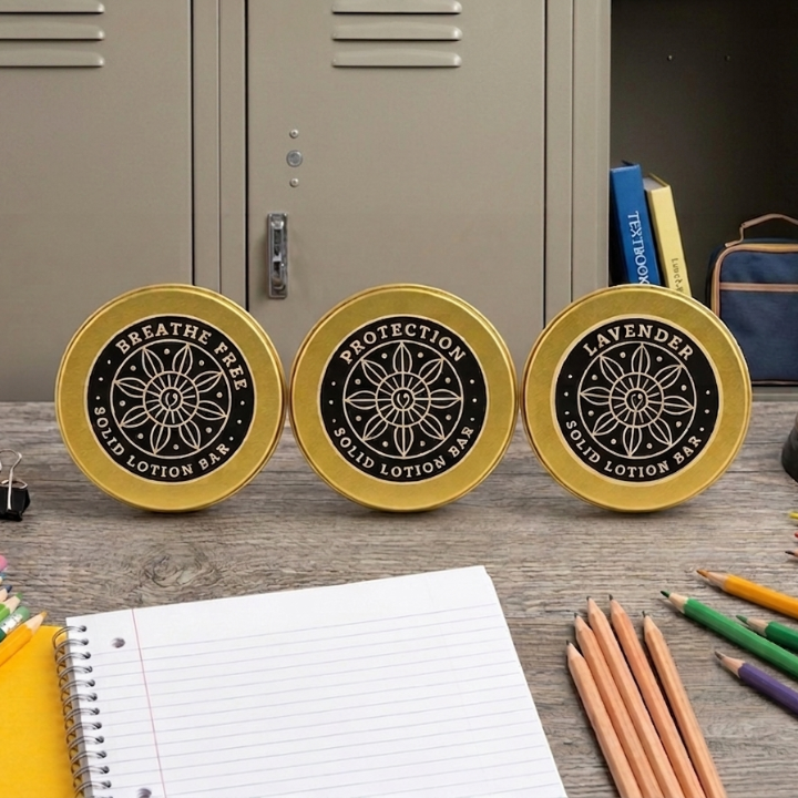 Back to School Wellness Set, three natural solid lotion bars in a back to school scene